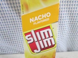 lot 210 image: (B-2) Box of 24 Slim Jim Nacho Smok...