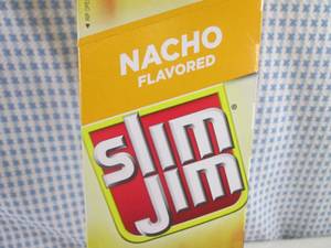 lot 211 image: (B-2) Box of 24 Slim Jim Nacho Smok...