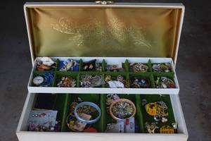 Buxton jewelery box filled with jew...