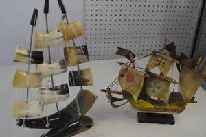 2 ships, one made from animal horns...