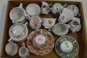 Tea cups, pitchers and saucers...