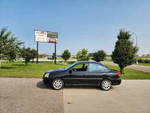 lot 1 image: 2003 Kia Rio