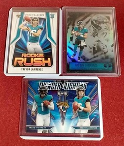 lot 12 image: (3) Trevor Lawrence Rookie Cards