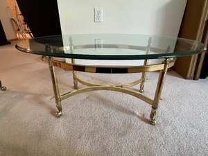 lot 24 image: Nice Oval Glass and Brass Coffee Table
