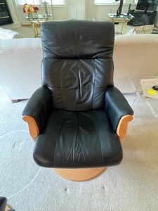 lot 27 image: Amazing Leather Gliding Chair by Avantglide with Ottomon