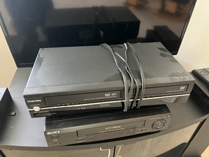 lot 43 image: Entertainment Bundle VCR, TV, VCR and DVD Combo, Entertainment Stand