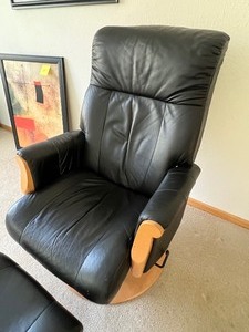 lot 45 image: Avantglide Glider Leather Chair and Ottoman