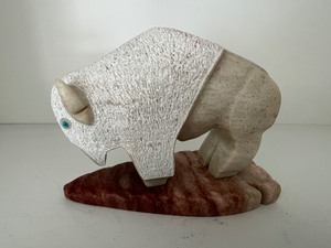 lot 100 image: Great Alabaster Buffalo Sculpture on Arrowhead shaped base by Ray Tody