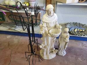 lot 4 image: Pair of Religious Garden Statues and Clay Pot Stakes