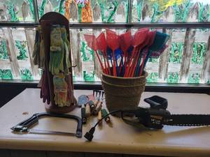 lot 17 image: Many Gardening Gloves on Display Rack, 30 Fly Swatters, Remington 14 Electric Saw, Gardening Tools and More