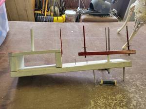 lot 19 image: Bow Making Machine and (3) Large Plastic Totes of Assorted Christmas Ribbons for Bow Maker