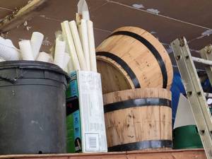 lot 26 image: Large Lot of Gardening Supplies and More - Craftsman Gas Blower, Tree Wraps, Whiskey Barrel Planters, Christmas Tree Stands and More