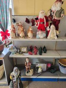 lot 31 image: Large Lot of Christmas Decor, Santa Claus Statue and More on (3) Shelves