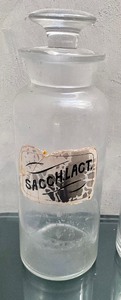 lot 12 image: Four Vintage Pharmaceutical Bottles