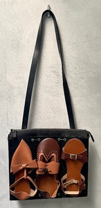 lot 52 image: Two Vintage Handbags by Michael Simon and Hobo