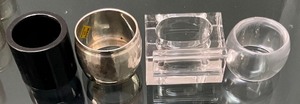 lot 53 image: Lucite, Silver Plated and Plastic Napkin Rings