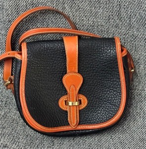 lot 40 image: Small Leather Dooney and Bourke Handbag and Coin Purse