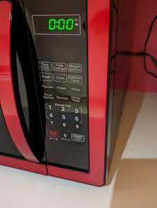 lot 111 image: Faberware Red Microwave