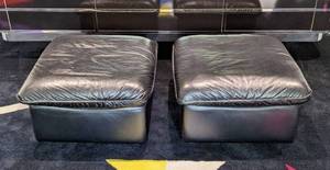 lot 18A image: Pair of Black Italian Leather Ottomans