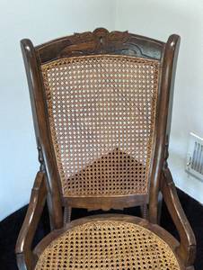 lot 136 image: Vintage Carved Wood and Cane Rocking Chair