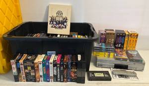 lot 9 image: Large Group Of VHS Movies With Panasonic 4-Head Hi-Fi Stereo Omnivision Player With Remote, Includes Titles Like E.T. NIB, Indiana Jones NIB, Star Wars, Star Wars The Empire Strikes Back And More