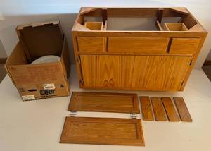 lot 80 image: Bathroom Vanity Cabinet With Two Doors And Drawers 42Wx 21D x 30T (Never Installed ) & A Sink (NIB)