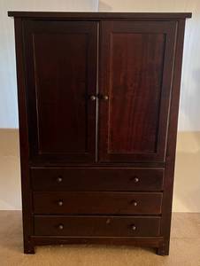 lot 82 image: 82 Large Dark Wood Three Drawer TV Armoire 41 34W x 21 12D x 66T