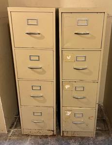 lot 200 image: Two Four Drawer Metal File Cabinets 52T x 25D x 15W (Great For Storing Tools) (BRING YOUR OWN HELP TO LOAD) IN BASEMENT