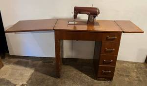 lot 203 image: Vintage Kenmore Sewing Machine Cabnet With Extras (BRING YOUR OWN HELP TO LOAD) IN BASEMENT