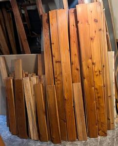 lot 213 image: Large Group Of Misc. Sizes Of Tongue And Groove Cedar (BRING YOUR OWN HELP TO LOAD) IN BASEMENT
