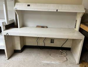 lot 215 image: Large White Work Station With Light 72W x 55T x 27D (BRING YOUR OWN HELP TO LOAD) IN BASEMENT