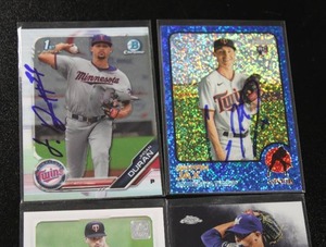 lot 42 image: Jhoan Duran - Griffin Jax - Jorge Lopez - Bailey Ober  In Person Autograph Lot of 4
