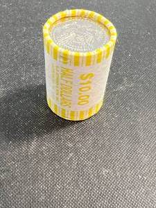 UNOPENED ROLL OF 20 UNC US KENNEDY HALF DOLLARS