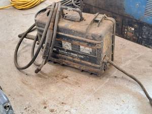 lot 25 image: Miller SuitCase X-TREME 12VS Voltage-Sensing Wire Feeder Welder