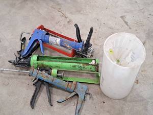 lot 115 image: Assorted Caulk Guns and Glue Guns with Extra Tips
