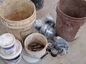 lot 121 image: Lot of (2 Buckets) Toe Protectors, CAUTION Tape, Tape, Joint Lubricant