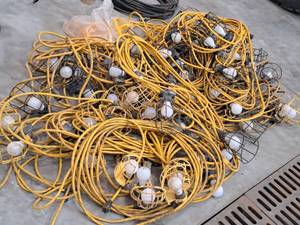 lot 227 image: Lot of (14) Outdoor Worklight String Light Strands with Extra Covers
