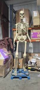 lot 1 image: Home Accents Holiday 12 ft Giant-Sized Skeleton with LifeEyes(TM) LCD Eyes