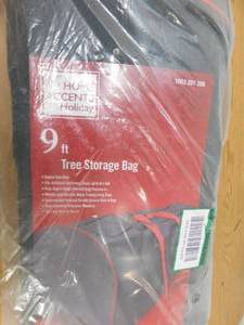 lot 40 image: Home Accents Holiday Red Rolling Tree Storage Bag for Trees Up to 9 ft. Tall