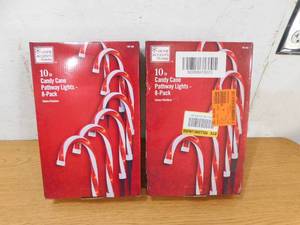 lot 145 image: (2) 8-Piece 10in Candy Cane Stake Lights