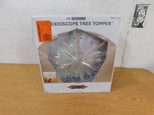 lot 163 image: LightShow 19 in Classic White Christmas Projection Kaleidoscope Starburst Christmas Tree Topper