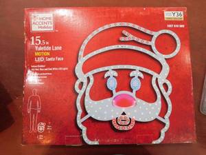 lot 132 image: Home Accents Holiday 16 in Hi-Vibrant LED Santa Holiday Yard Decoration