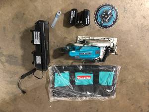Makita 18V X2 LXT 5.0Ah Lithium-Ion (36V) Brushless Cordless Rear Handle 7-14 in. Circular Saw Kit  Customer Returns See Pictures