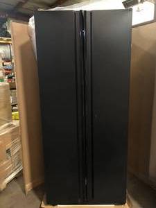 lot 20 image: Husky Heavy Duty Welded 20-Gauge Steel Freestanding Garage Cabinet in Black (36 in. W x 81 in. H x 24 in. D)    Customer Returns See Pictures