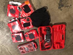 lot 43 image: Lot of Milwaukee T-shirts Tool and accesories various types and conditions Customer Returns See Pictures