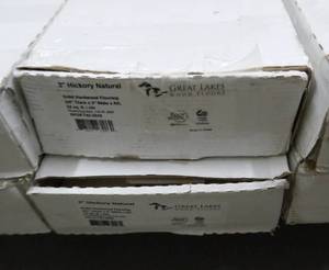 lot 21 image: Two New boxes of 3 inch Hickory Natural solid hardwood flooring