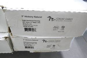 lot 22 image: Two New boxes of 3 inch Hickory Natural solid hardwood flooring