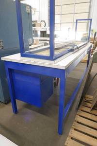 lot 26 image: Blue metal work bench with top with electrical and light 8 ft long