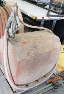 lot 45 image: Gas tank with manual pump