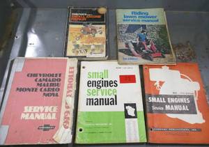 lot 71 image: Small Engine repair manuals, a 1979 Chevy manual and some tractor manuals